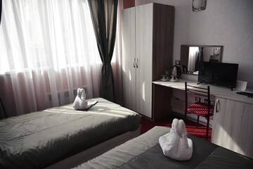 Фото номера Двухместный номер с 2 отдельными кроватями Отель NAYS г. Madan 14